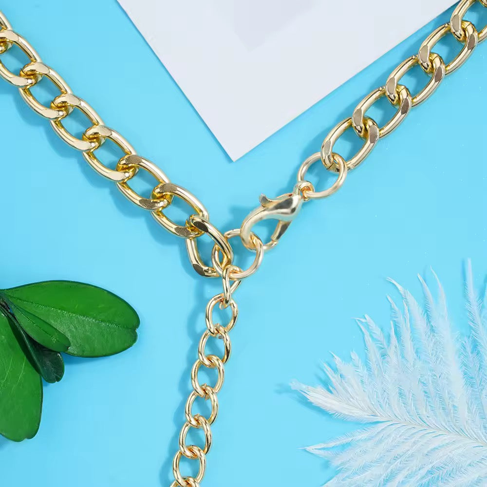 Tapa-Seios Estrela com Harness e Correntes - Domínio e Sedução em Um Só Look