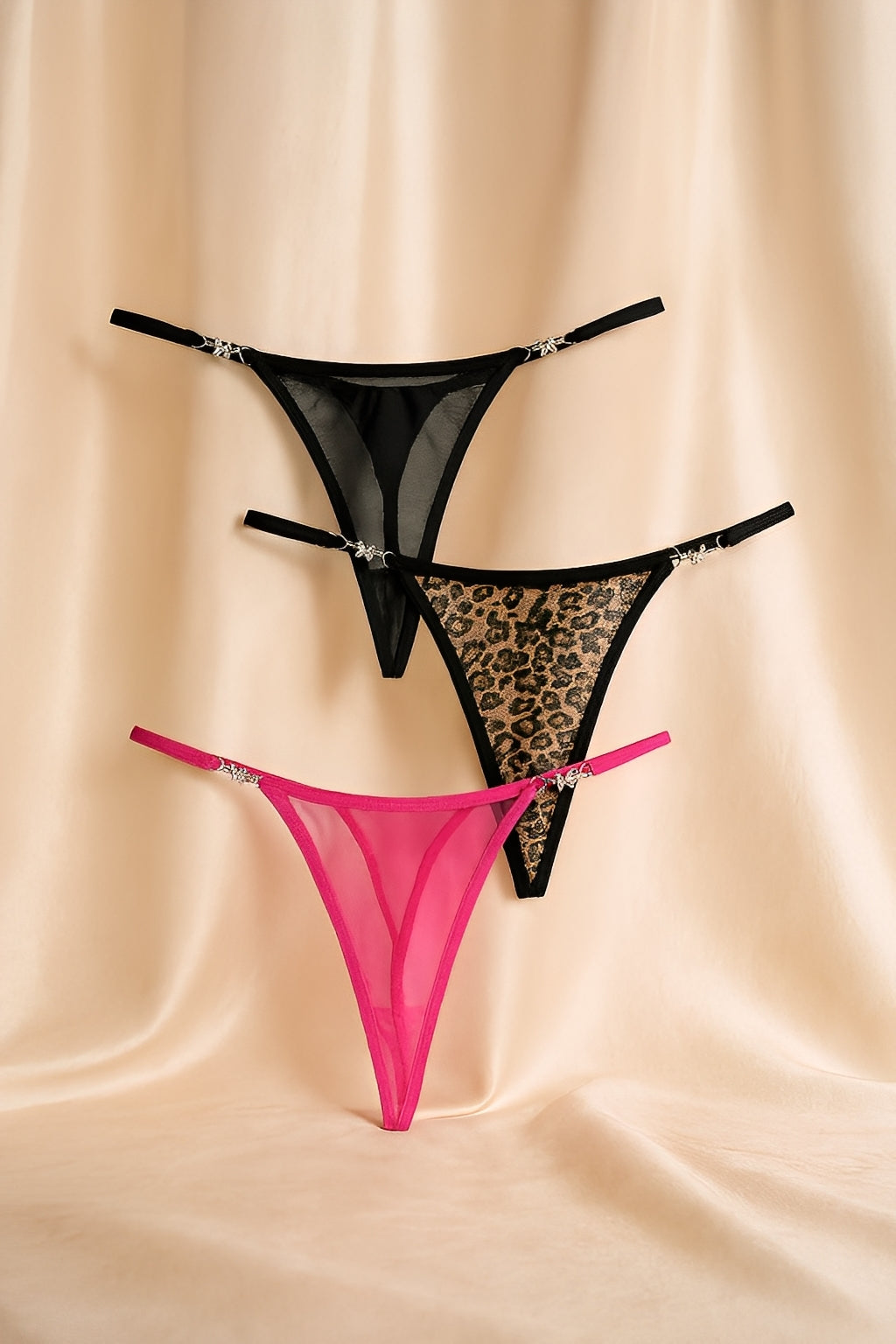 Kit com 3 Calcinhas Fio Dental em Tule e Animal Print com Detalhe Borboleta - P ao GG